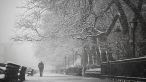 man-walking-winter-streets